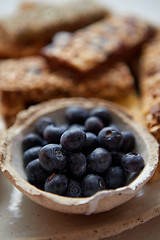 Image showing Close up of blackberries. With various energy nutrition bars in background