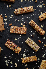 Image showing Mixed gluten free granola cereal energy bars. With dried fruits and nuts