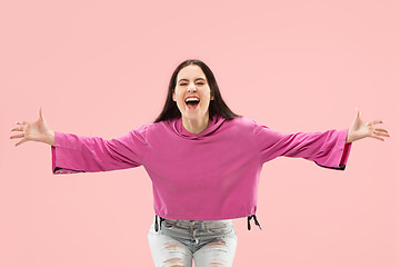 Image showing Winning success woman happy ecstatic celebrating being a winner. Dynamic energetic image of female model