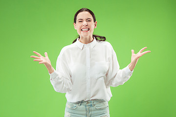 Image showing Winning success woman happy ecstatic celebrating being a winner. Dynamic energetic image of female model