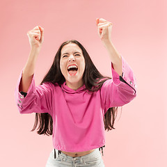 Image showing Winning success woman happy ecstatic celebrating being a winner. Dynamic energetic image of female model