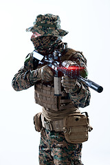 Image showing soldier in action aiming laseer sight optics