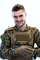 Image showing closeup of soldier hands putting protective battle gloves