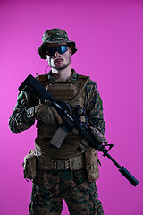 Image showing modern warfare soldier pink backgorund