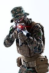 Image showing soldier in action aiming laseer sight optics