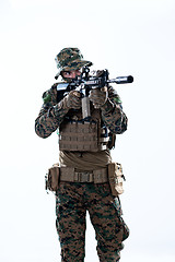 Image showing soldier in action aiming laseer sight optics