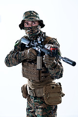 Image showing soldier in action aiming laseer sight optics