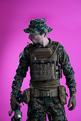 Image showing modern warfare soldier pink backgorund