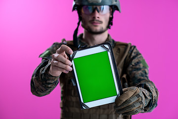 Image showing soldier showing a tablet with a blank green screen