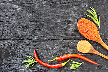 Image showing Frame of different pepper on black board top