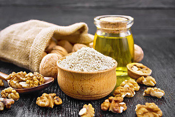 Image showing Flour walnut in bowl on board