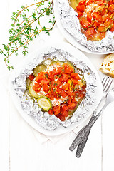 Image showing Salmon with vegetables in plate on light board top