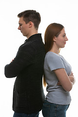 Image showing A man and a woman got into a quarrel and stood with their backs to each other