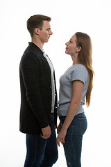 Image showing a young man and a girl stand opposite each other