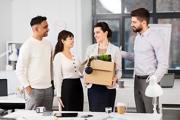 Image showing new female employee with colleagues at office