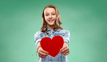 Image showing girl with red heart over green school chalk board