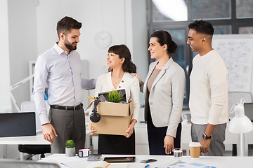 Image showing new female employee with colleagues at office