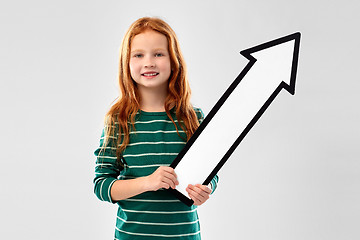 Image showing smiling red haired girl with arrow showing up