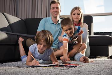 Image showing young couple spending time with kids