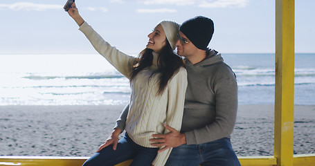 Image showing Gorgeous couple taking picture of herselfe