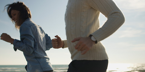 Image showing Young family enjoying vecation during autumn