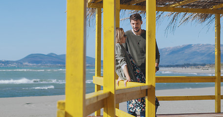 Image showing Couple chating and having fun at beach bar