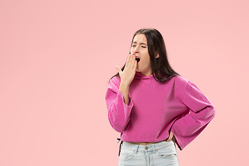 Image showing Beautiful bored woman bored isolated on pink background