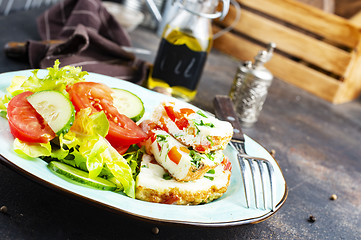 Image showing omelette with vegetables on white plate