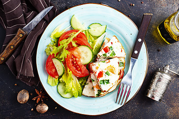 Image showing omelette with vegetables on white plate