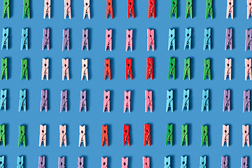 Image showing Laundry background from colorful clothespegs.