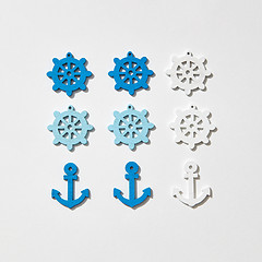 Image showing Marine pattern from anchors and wheels.