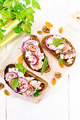 Image showing Bruschetta with fish and curd on white board top