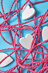 Image showing Valentine\'s card with red rope and white hearts.