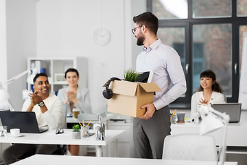 Image showing office workers applauding to male colleague