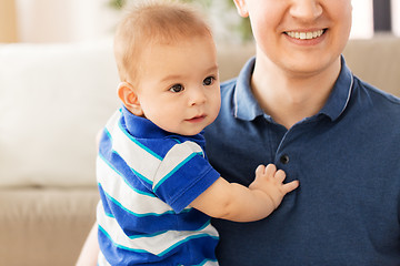 Image showing happy baby son with father at home