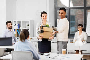 Image showing new female employee meeting colleagues at office