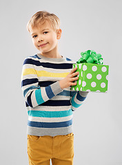 Image showing smiling boy with birthday gift box