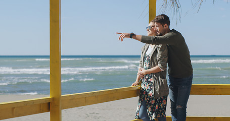 Image showing Couple chating and having fun at beach bar