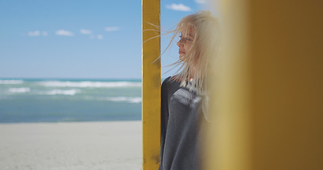 Image showing Young woman enjoying the warm autumn day