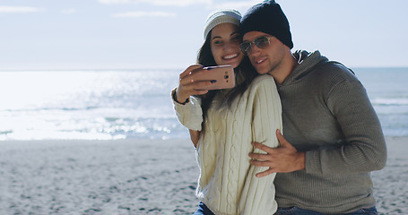 Image showing Gorgeous couple taking picture of herselfe