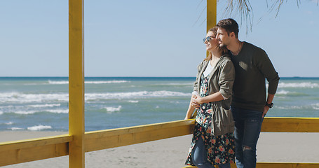 Image showing Couple chating and having fun at beach bar