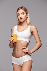 Image showing Perfect slim toned young body of the girl .