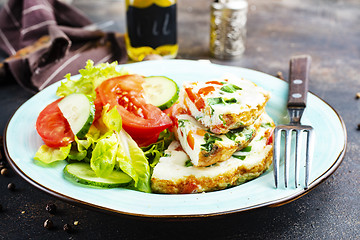 Image showing omelette with vegetables on white plate