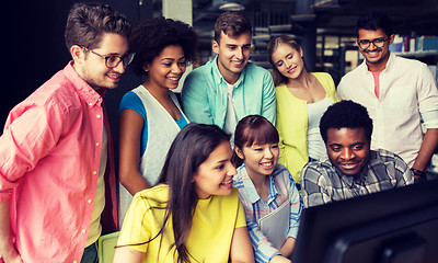 Image showing international students with computers at library