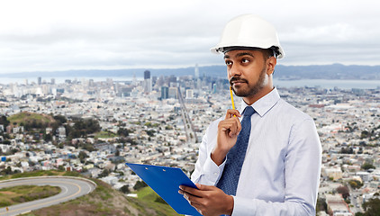 Image showing architect or businessman in helmet with clipboard