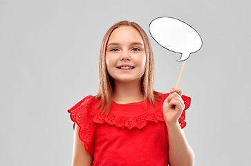 Image showing smiling girl in red holding blank speech bubble