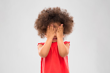 Image showing little african american girl closing her eyes