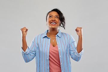 Image showing happy african american woman celebrating success