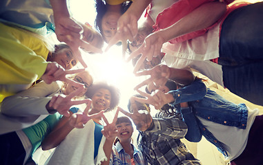 Image showing international students showing peace or v sign