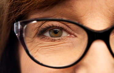 Image showing close up of face of senior woman in glasses